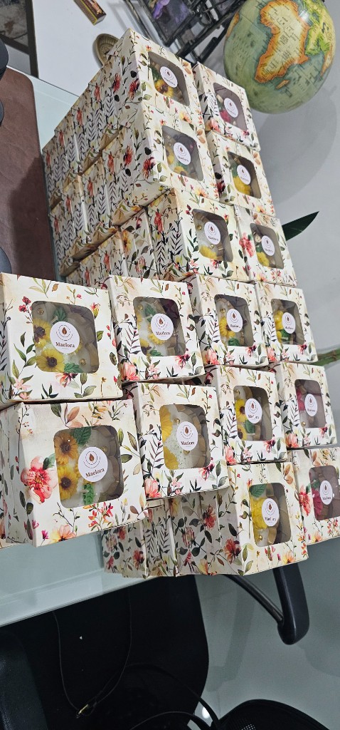 A recent bulk order of Maelora Small Urli Candles packed in floral gift boxes