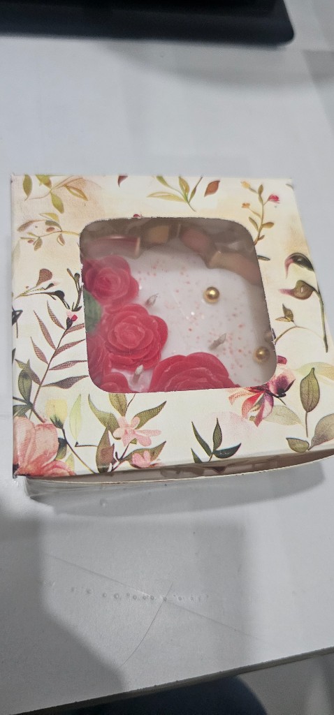 Small Urli Candle by Maelora packaged in a floral window gift box