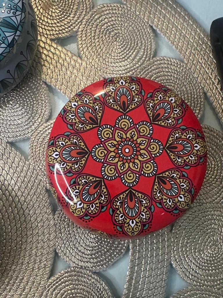 Maelora Red Mandala tin candle with deep red floral ornamental pattern