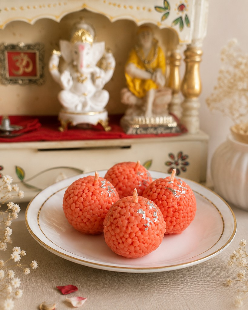 Handcrafted motichoor laddu Diwali candles by Maelora with silver foil